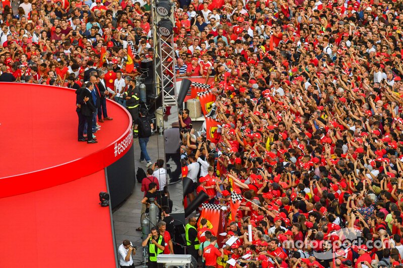 Former Ferrari F1 drivers gather on the stage in front of the crowd