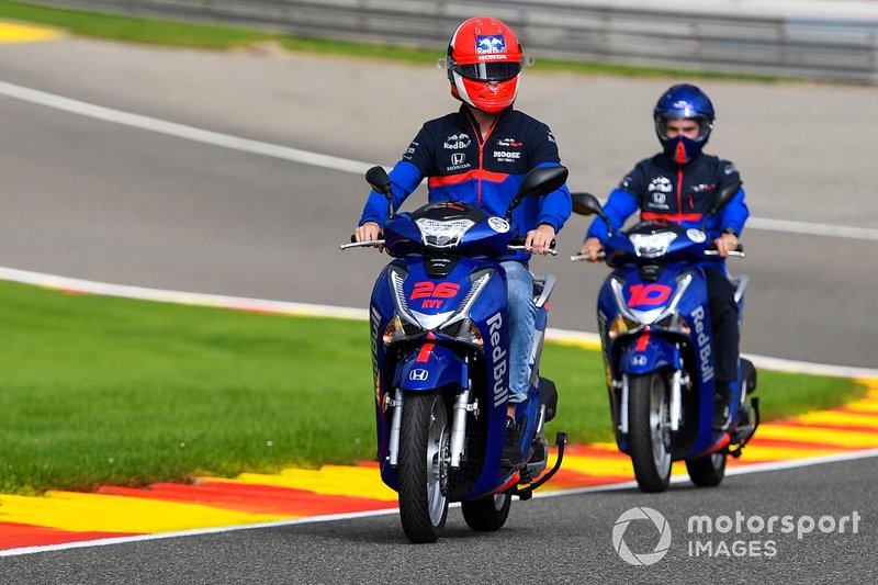 Daniil Kvyat, Toro Rosso, rides a scooter