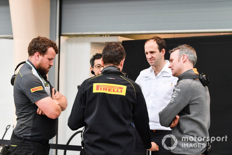 Pirelli staff talking to McLaren