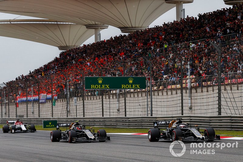 Romain Grosjean, Haas F1 Team VF-19, leads Kevin Magnussen, Haas F1 Team VF-19