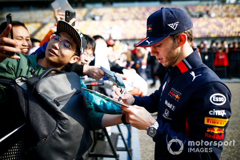 Pierre Gasly, Red Bull Racing signs an autograph for a fan