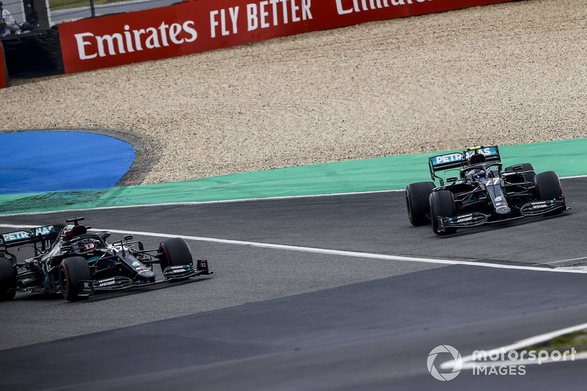 Lewis Hamilton, Mercedes F1 W11, passes Valtteri Bottas, Mercedes F1 W11, as he retires with power loss