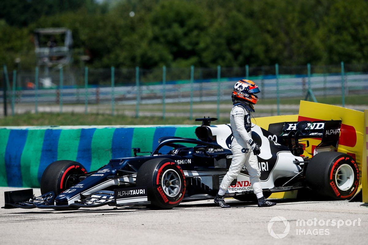 Yuki Tsunoda, AlphaTauri, walks away from his car after spinning out in practice