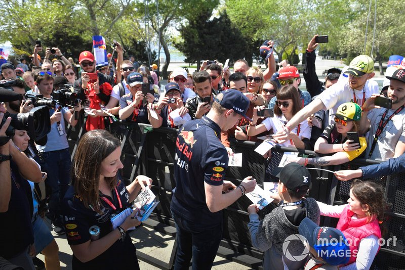 Max Verstappen, Red Bull Racing signs an autograph for a fan