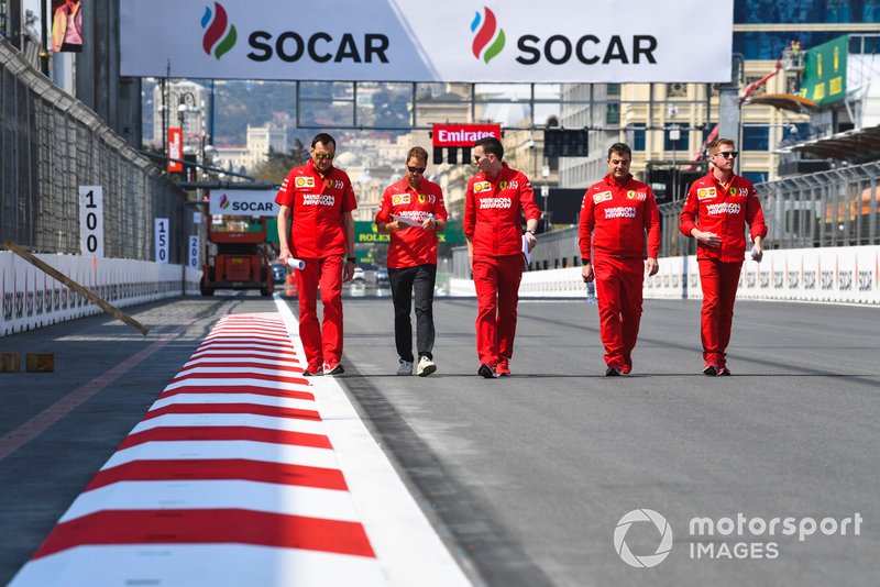 Sebastian Vettel, Ferrari walks the track with his engineers