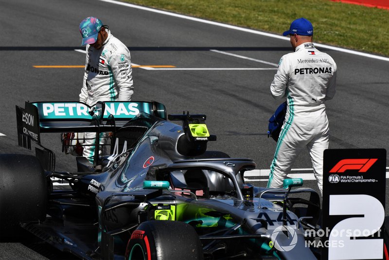 Lewis Hamilton, Mercedes AMG F1, and pole man Valtteri Bottas, Mercedes AMG F1, on the grid after Qualifying