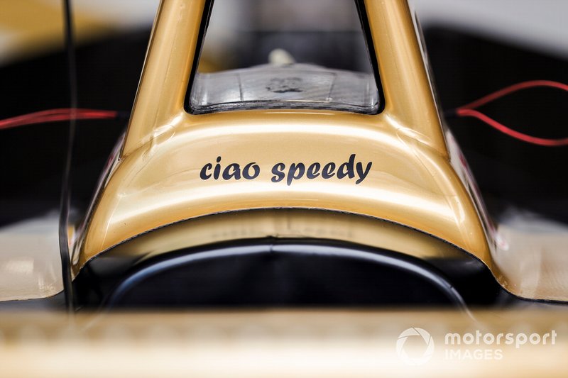 Antonio Felix da Costa, DS Techeetah, applies a 'Ciao Speedy' sticker to his car in memory of motorcyclist Paulo Goncalves, who tragically died after an accident at the Dakar Rally 2020