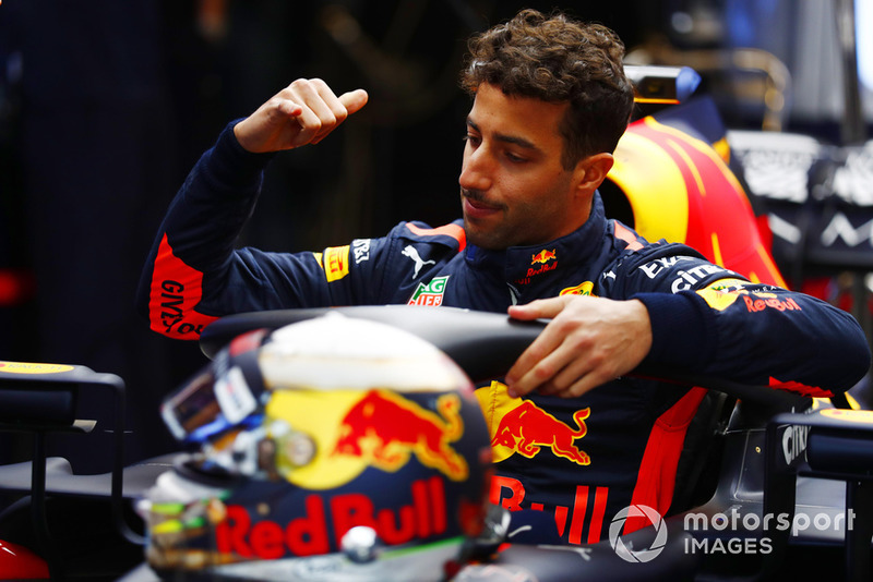 Daniel Ricciardo, Red Bull Racing RB14, climbs into the cockpit of his car