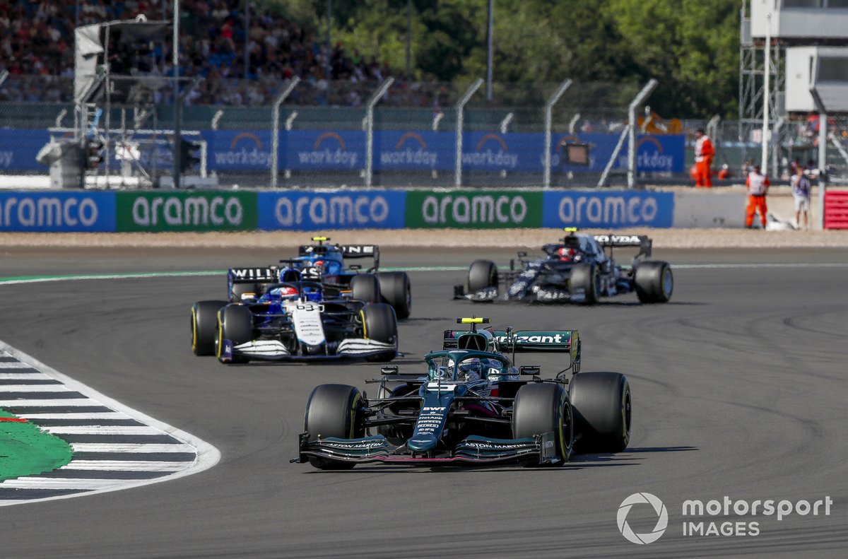 Sebastian Vettel, Aston Martin AMR21, George Russell, Williams FW43B, and Esteban Ocon, Alpine A521
