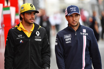 Carlos Sainz Jr., Renault Sport F1 Team and Sergio Perez, Racing Point Force India F1 Team