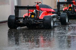 Rain pours on the car of Nikita Mazepin, ART Grand Prix