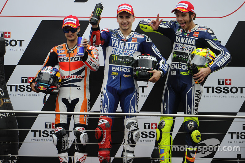 Podium: second place Dani Pedrosa, Repsol Hona; Race winner Jorge Lorenzo, Yamaha; third place Valen