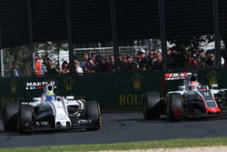 Felipe Massa, Williams FW38 and Romain Grosjean, Haas F1 Team VF-16