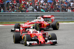 Kimi Raikkonen, Scuderia Ferrari SF16-H leads Sebastian Vettel, Scuderia Ferrari SF16-H