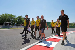Esteban Ocon, Renault Sport F1 Team Test Driver and Kevin Magnussen, Renault Sport F1 Team walk the