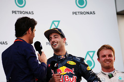 Race winner Daniel Ricciardo, Red Bull Racing on the podium with Mark Webber, Porsche Team WEC Drive