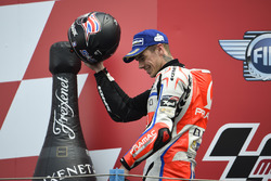 Scott Redding, Pramac Racing, sur le podium après sa troisième place
