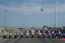 Albert Arenas, Peugeot MC Saxoprint, John McPhee, Peugeot MC Saxoprint, Fabio Spiranelli, CIP, Tatsuki Suzuki, CIP, Jorge Martin, Aspar Team Mahindra, Stefano Manzi, Mahindra Racing, Francesco Bagnaia, Aspar Team Mahindra, Darryn Binder, Platinum Bay Real Estate, Marcos Ramirez, Platinum Bay Real Estate, Lorenzo Petrarca, 3570 Team Italia, Stefano Valtulini, 3570 Team Italia celebrate Mahindra 100th Grand Prix