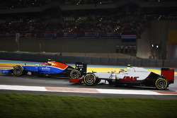 Esteban Ocon, Manor MRT05, leads Esteban Gutierrez, Haas VF-16