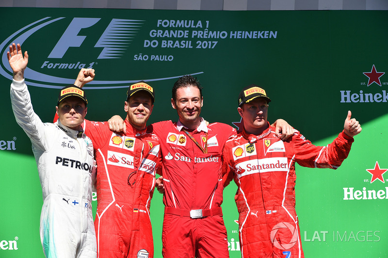 Podium: winner Sebastian Vettel, Ferrari, second place Valtteri Bottas, Mercedes AMG F1, third place Kimi Raikkonen, Ferrari