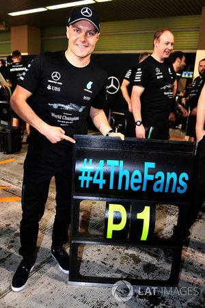 Race winner Valtteri Bottas, Mercedes AMG F1 and pitboard at the team celebrations