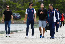 Lance Stroll, Williams Racing, arrives at the circuit with colleagues