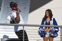 Usain Bolt, grid girl op het podium