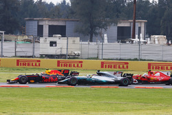 Max Verstappen, Red Bull Racing RB13, leads, Lewis Hamilton, Mercedes AMG F1 W08 and Sebastian Vette
