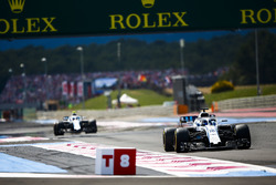 Lance Stroll, Williams FW41, leads Sergey Sirotkin, Williams FW41