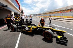 Aseel Al-Hamad, prepares to drive a 2012 Lotus E20 Renault F1 car in the Renault Passion Parade