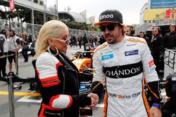 Singer Christina Aguilera with Fernando Alonso, McLaren, on the grid