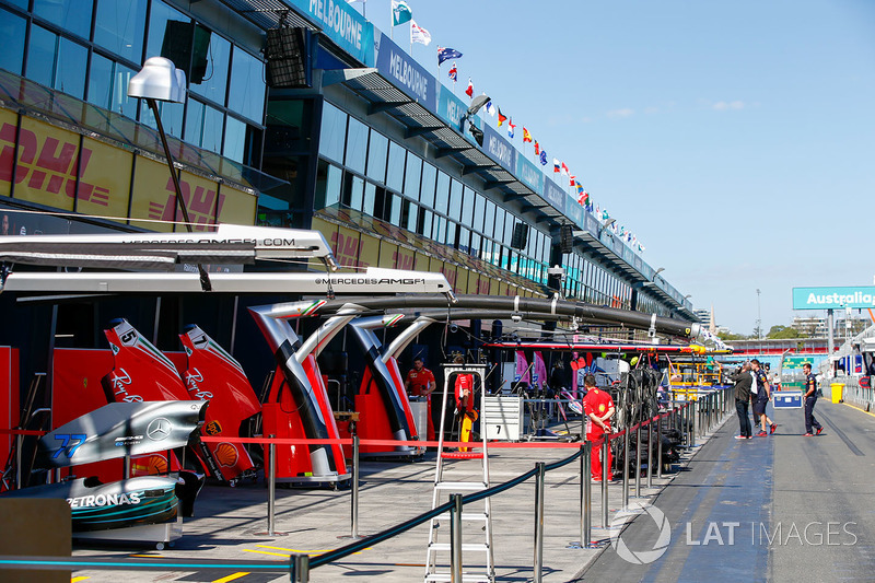 Mercedes AMG F1 and Ferrari garages in the pitman