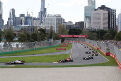Kevin Magnussen, Haas F1 Team VF-18 leads Max Verstappen, Red Bull Racing RB14 at the start of the r