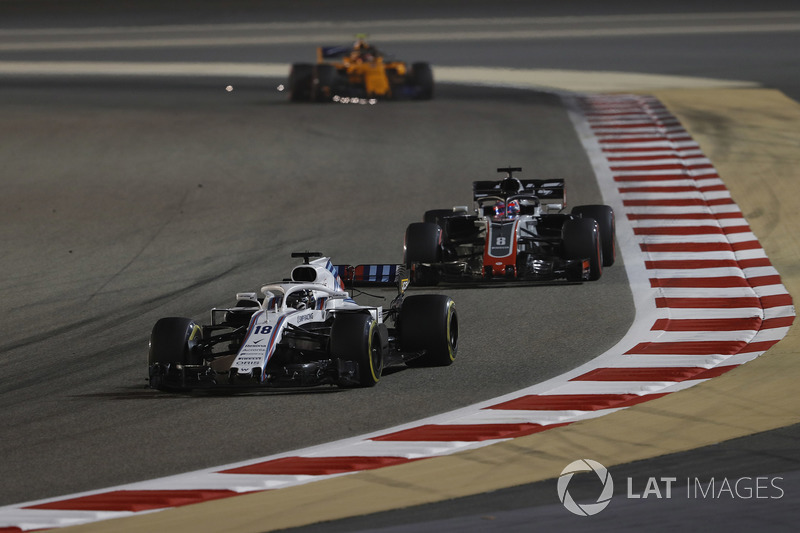Lance Stroll, Williams FW41 Mercedes, Romain Grosjean, Haas F1 Team VF-18 Ferrari