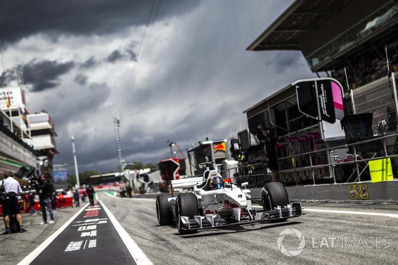 Руперт Гринт и пилот F1 Experiences Патрик Фризахер