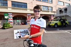 Charles Leclerc, Sauber with signed print by Sebastian Vettel, Ferrari from F1 Testing