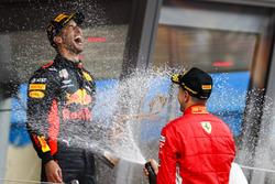 Race winner Daniel Ricciardo, Red Bull Racing, is sprayed with Champagne