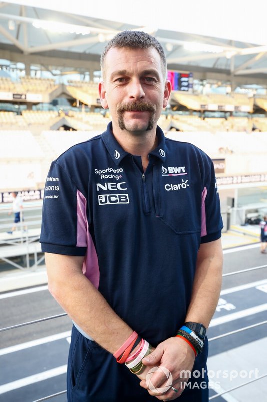 A Movember prize is awarded to a Racing Point team member