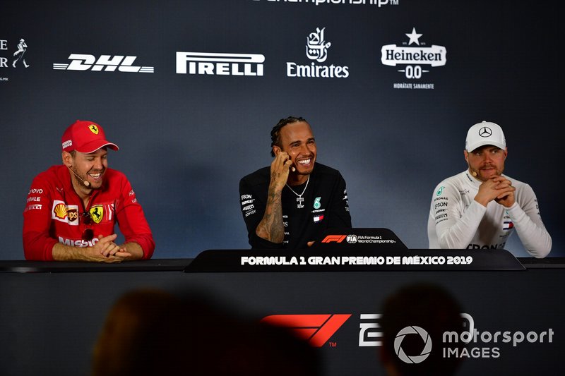 Sebastian Vettel, Ferrari, Race winner Lewis Hamilton, Mercedes AMG F1 and Valtteri Bottas, Mercedes AMG F1