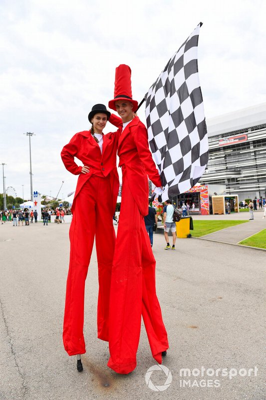 Performers on stilts