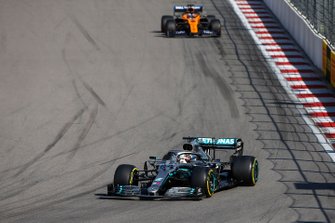 Lewis Hamilton, Mercedes AMG F1 W10, leads Carlos Sainz Jr., McLaren MCL34