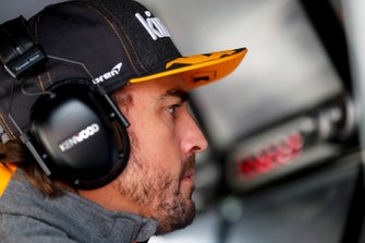 Fernando Alonso on the McLaren pit wall
