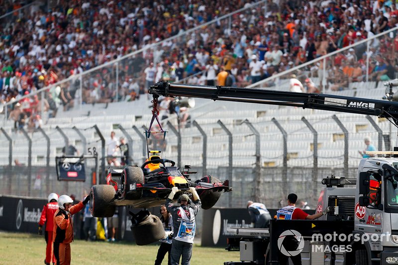 Car of Pierre Gasly, Red Bull Racing RB15 being recovered by marshals after a crash