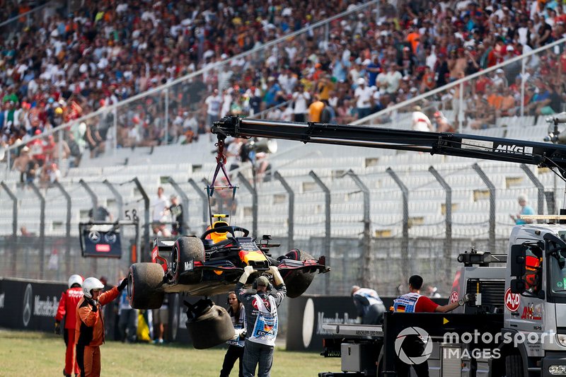 Car of Pierre Gasly, Red Bull Racing RB15 being recovered by marshals after a crash 