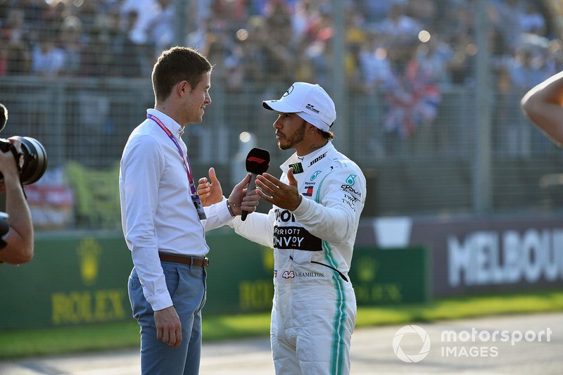 Lewis Hamilton, Mercedes AMG F1, is interviewed by Paul di Resta, Sky Sports F1, after securing pole