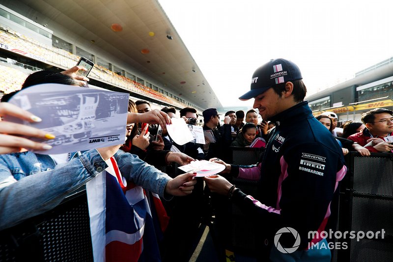 Lance Stroll, Racing Point signs an autograph for a fan