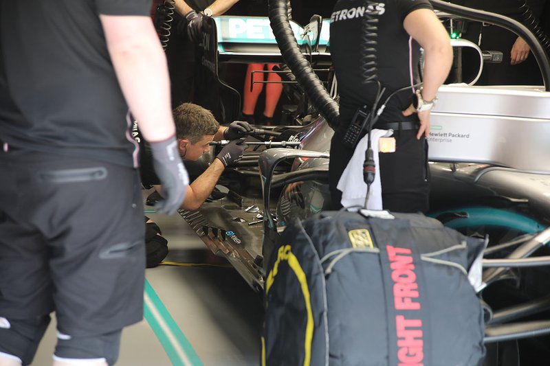 Team member at work on the Mercedes AMG F1 W10