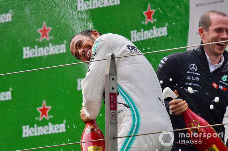 Lewis Hamilton, Mercedes AMG F1, 1st position, sprays Champagne on the podium