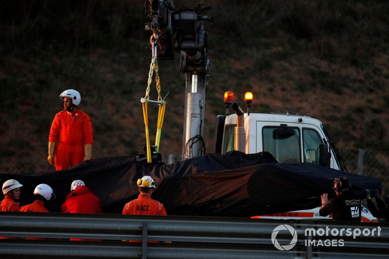 The car of Romain Grosjean, Haas F1 Team VF-19 is recovered