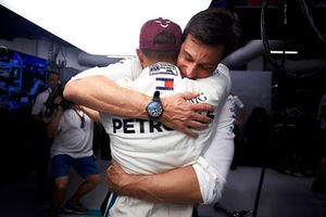 Toto Wolff, Executive Director (Business), Mercedes AMG, and Lewis Hamilton, Mercedes AMG F1, celebrate pole